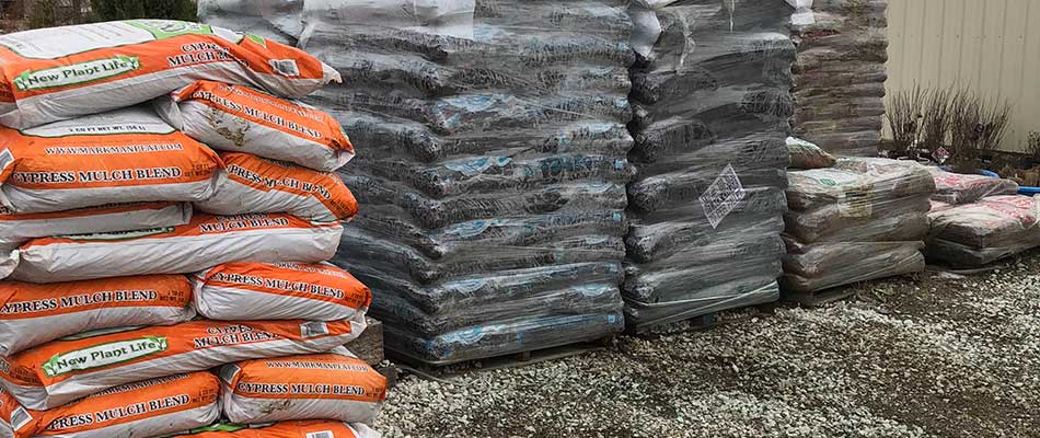 Stacks of landscaping mulch in bags in Denison, IA.